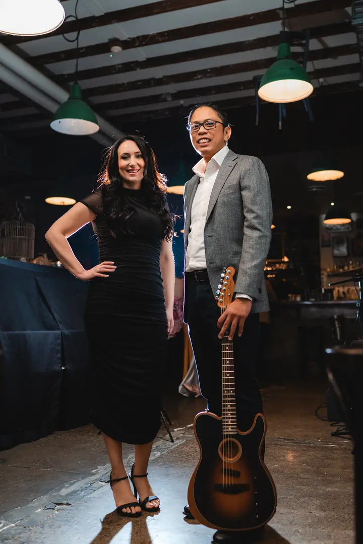 Linda Dagher and Adrian San Juan after an acoustic duo performance in Sydney